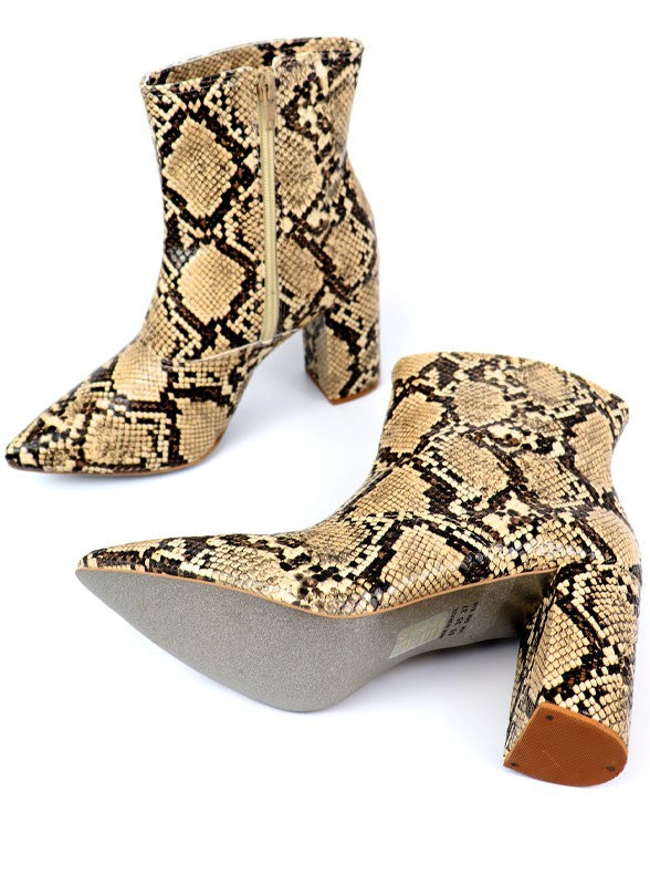 Pointed Toe Bootie with a Block Heel - House of Binx