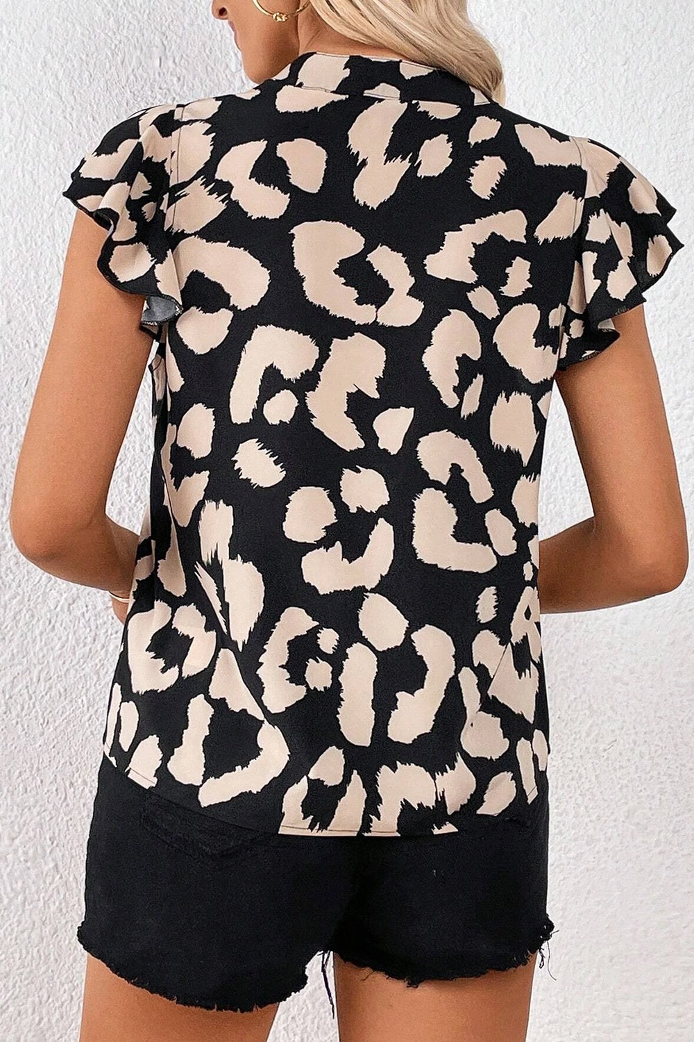 Leopard Notched Cap Sleeve Blouse - House of Binx