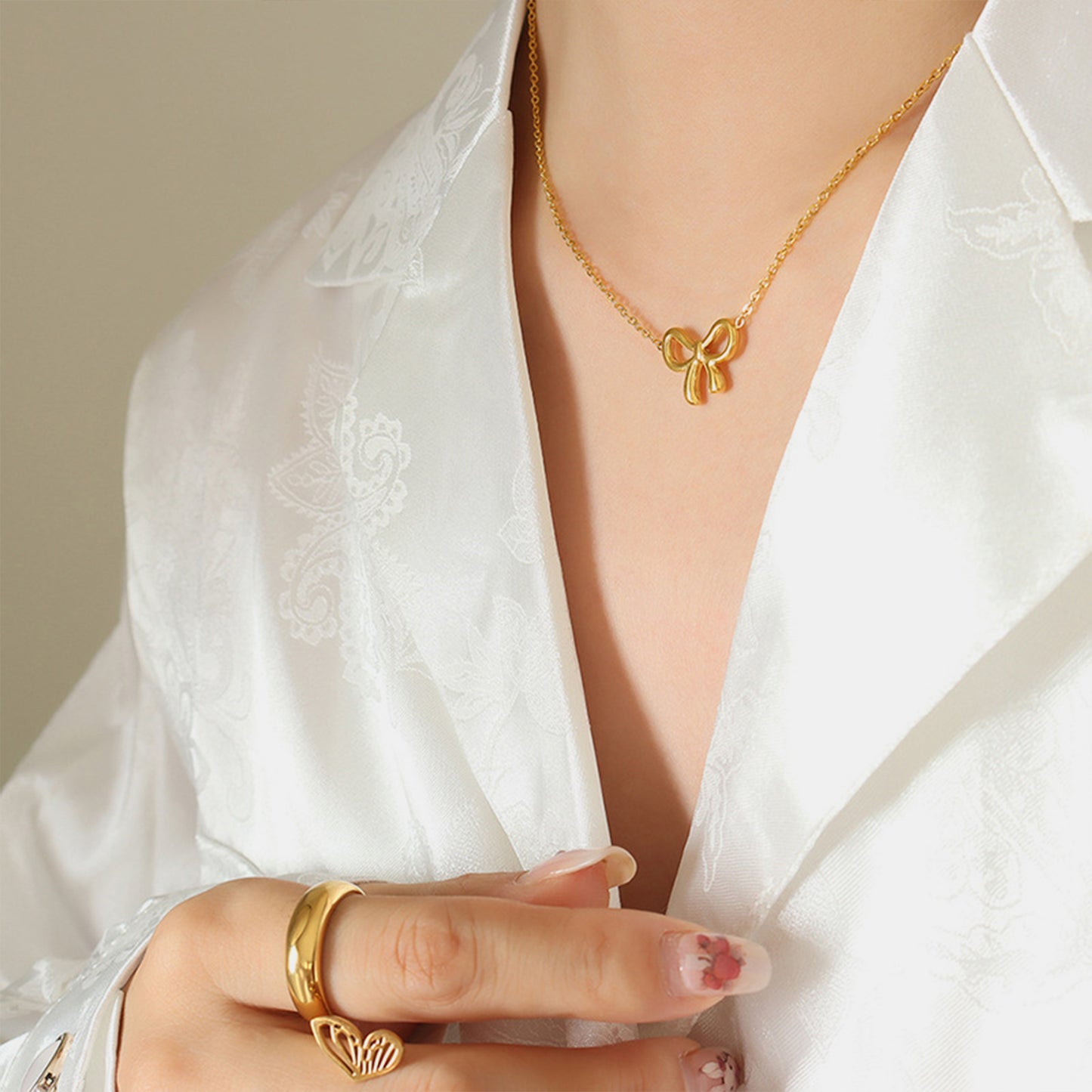 Gold-Plated Titanium Steel Bow Pendant Necklace - House of Binx