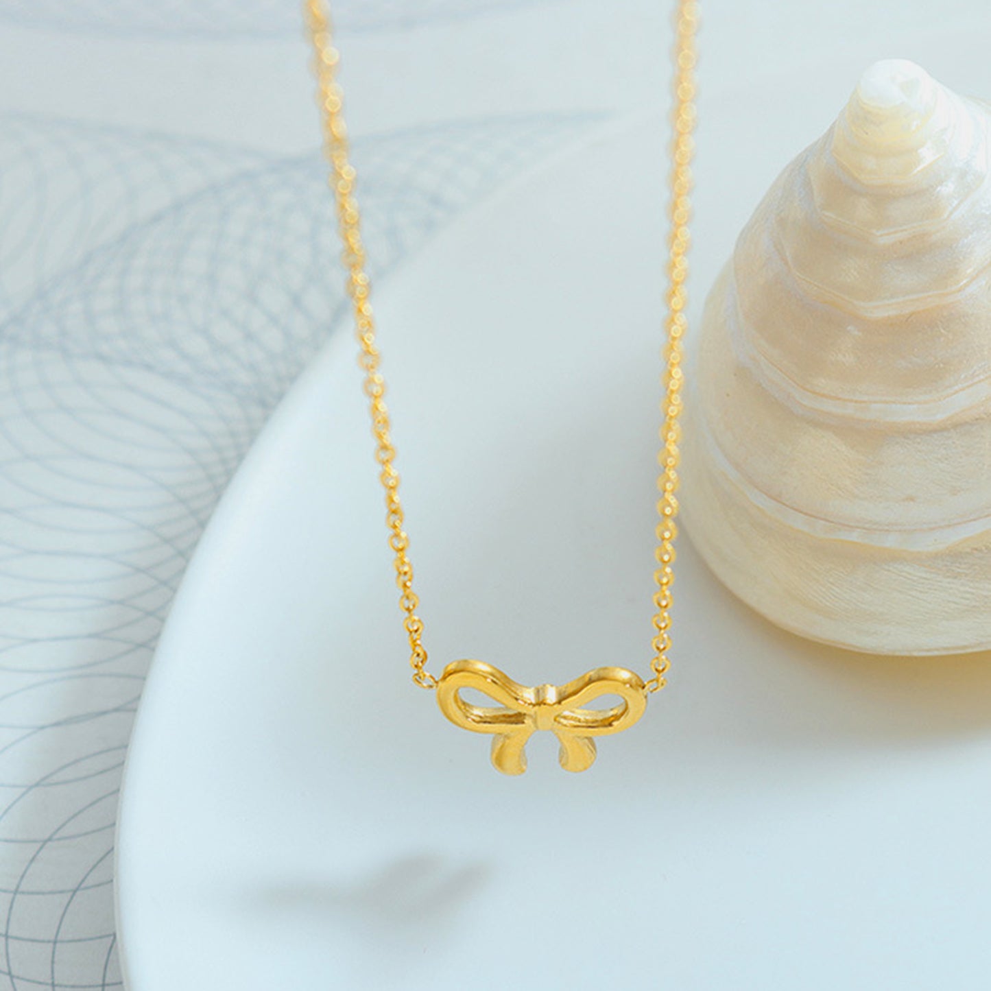 Gold-Plated Titanium Steel Bow Pendant Necklace - House of Binx