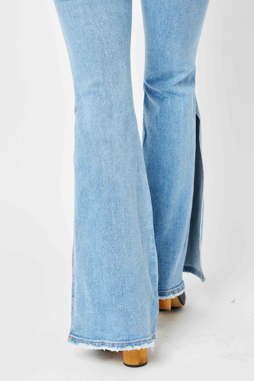 Judy Blue Full Size Mid Rise Raw Hem Slit Flare Jeans - House of Binx