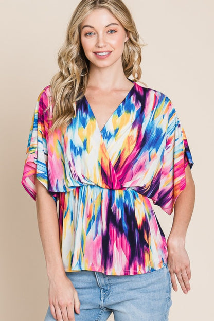 BOMBOM Printed Surplice Peplum Blouse - House of Binx 